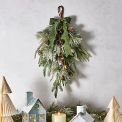 Cypress Winter Swag with Bells and Velvet Bow
